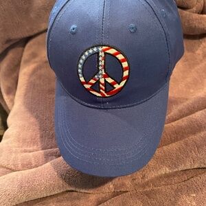 BERKSHIRE NWT blue ball cap with embroidered flag peace sign, adjustable plastic